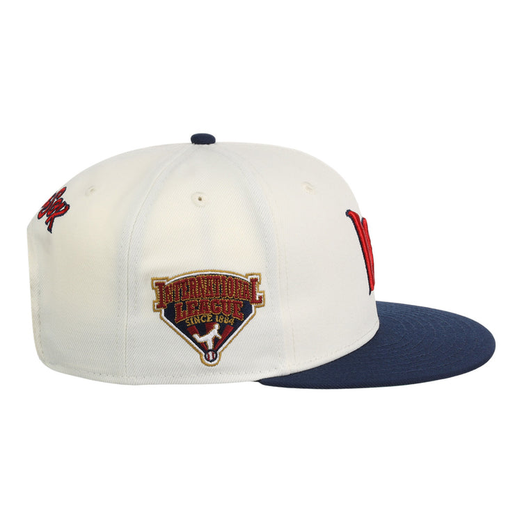 The Ebbets Field Worcester Red Sox MiLB Snapback Ballcap is white with a navy brim, a red letter logo on the front, 