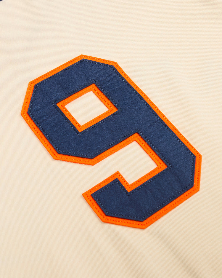 Cream-colored Ebbets Field San Francisco Sea Lions Cotton Twill Baseball Jersey featuring a large navy blue number nine patch with an orange border.