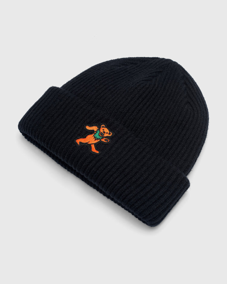 Black rib-knit Grateful Dead Dancing Bear Felt Patch Ribbed Beanie with a folded cuff featuring an embroidered dancing bear patch.