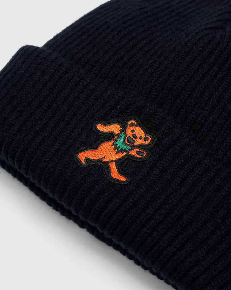 Black rib-knit Grateful Dead Dancing Bear Felt Patch Ribbed Beanie with an embroidered orange dancing bear patch.