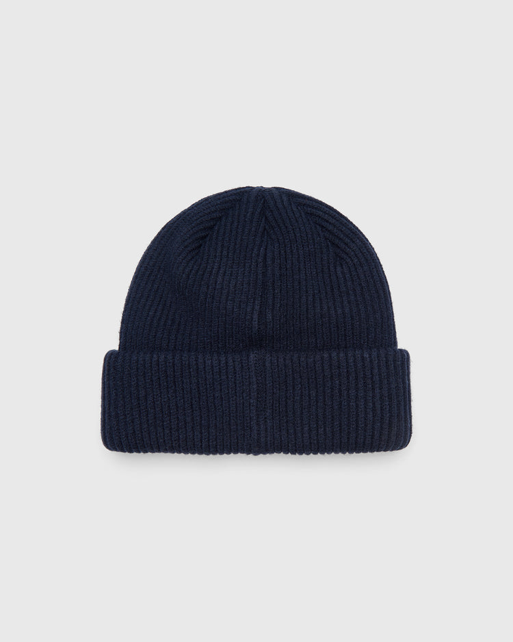 Dark blue Ebbets Field Hiroshima Carp Felt Patch Ribbed Beanie with a folded cuff.