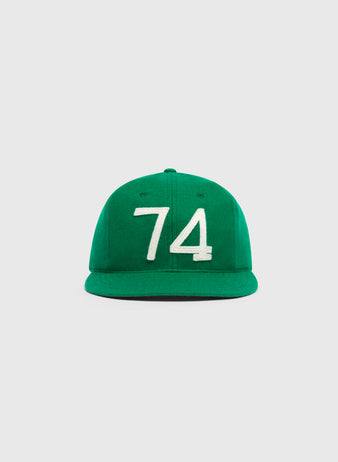 Mystery Caps of Mexico – 74 Regimento de Puebla 1925 Wool Ballcap by Ebbets Field, a green wool baseball cap featuring the white felt number 74.