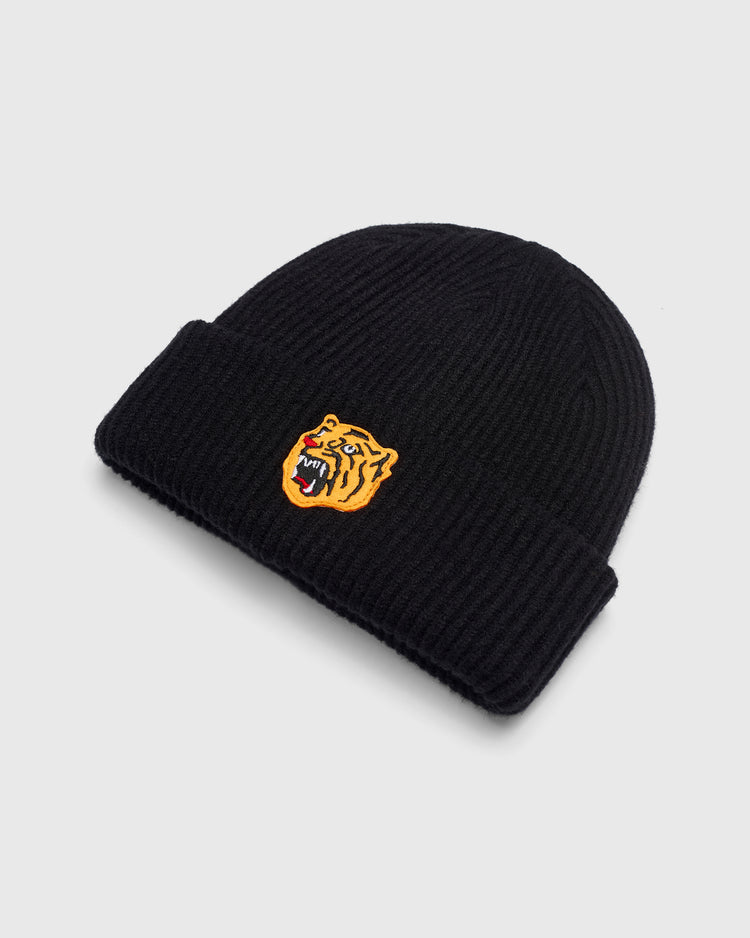 Black ribbed Ebbets Field Osaka Tigers Beanie Felt Patch Ribbed Beanie featuring a felt patch of a roaring tiger’s head on the cuff.