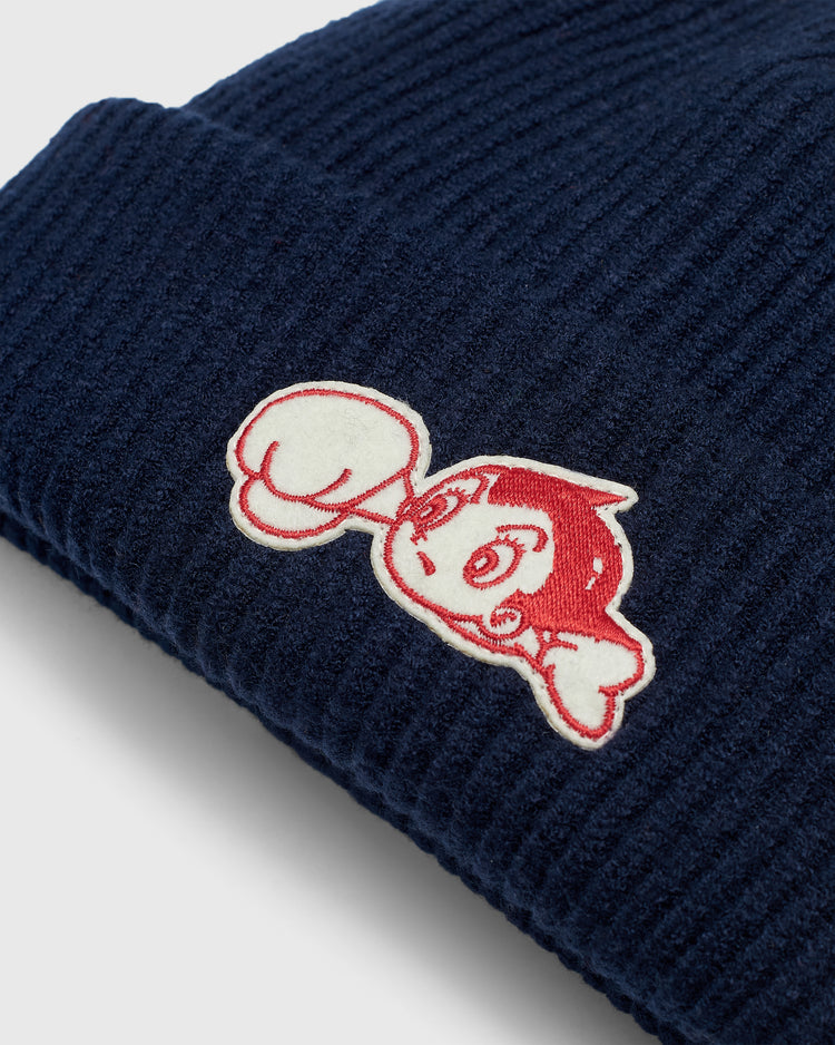 Navy blue Sankei Atoms Felt Patch Ribbed Beanie featuring an embroidered patch of Astro Boy with red and white details.