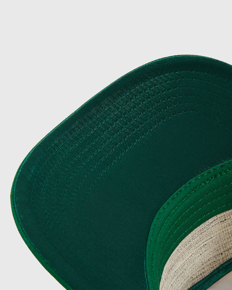 Close-up of the underside of a green New York Cosmos A-Frame Cotton Twill Ballcap by Ebbets Field, highlighting detailed stitching and inner band for a vintage-inspired look.