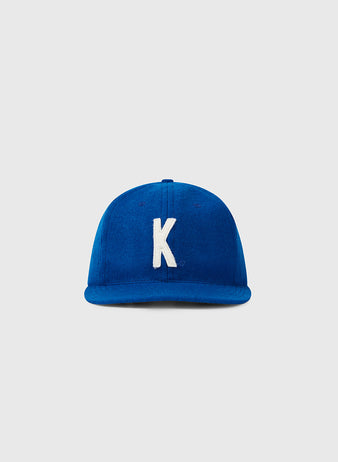 The EFF University of Kentucky 1964 Vintage Ballcap features royal blue fabric with a white embroidered “K” on the front, authentically reproduced and shown against a plain light gray background.