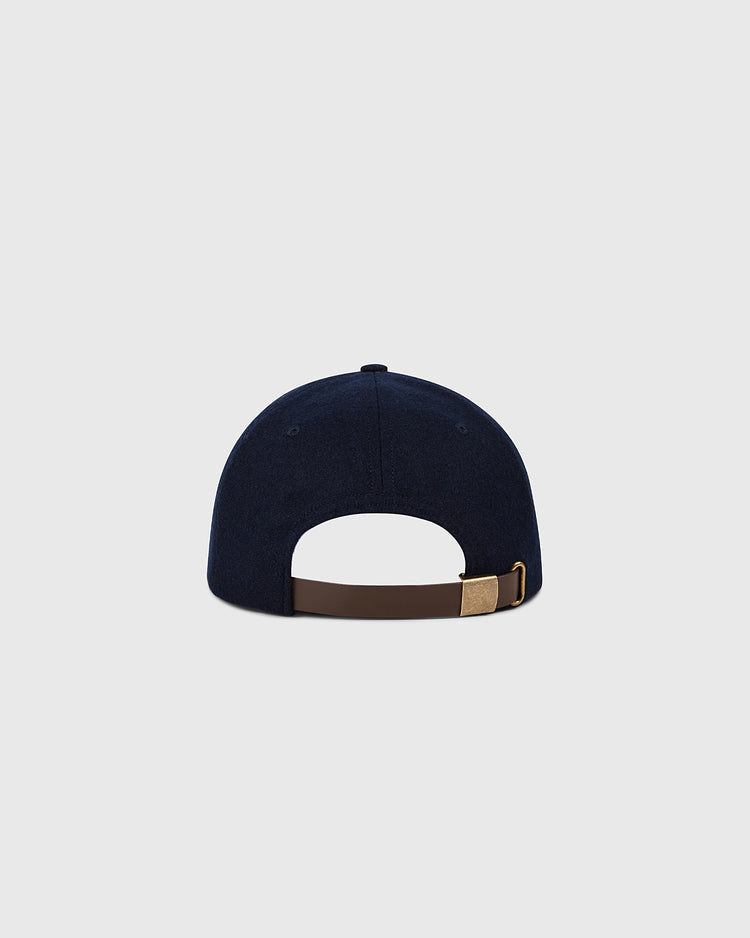 The Ebbets Field Boston Red Sox 1955 MLB Authentic Wool Ballcap is shown from the back, highlighting its brown adjustable strap with a gold clasp, echoing classic on-field style, against a plain light gray background.