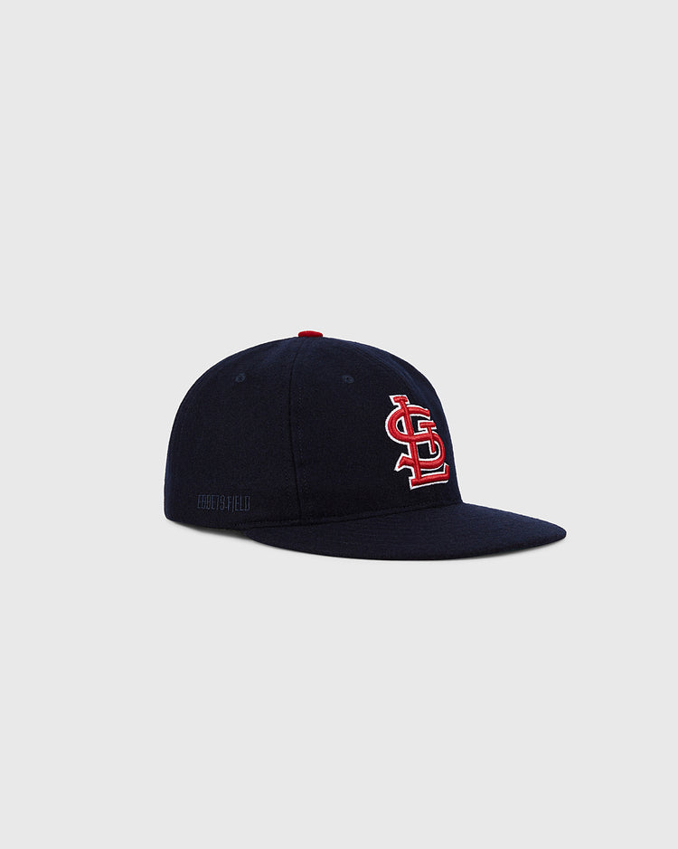 The Ebbets Field St. Louis Cardinals 1963 MLB Authentic Wool Ballcap, in navy with a red and white interlocking STL logo, is shown on a plain light gray background.