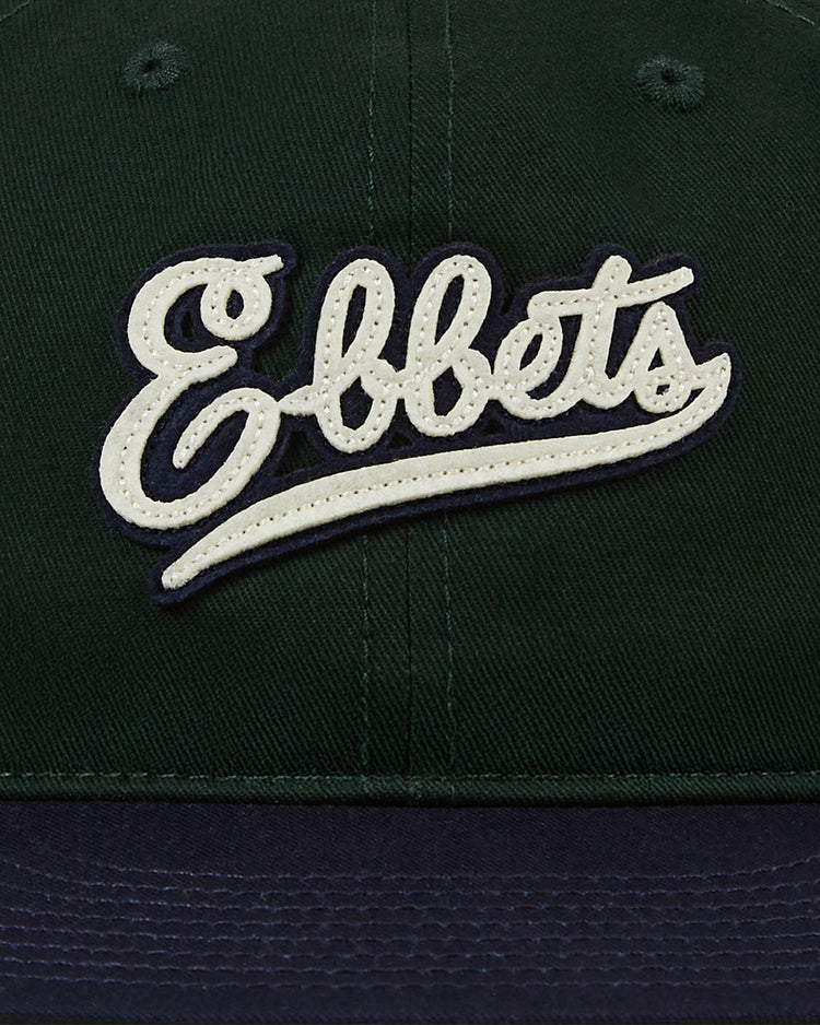 The Ebbets Felt Script Cotton Twill Ballcap by Ebbets Field Flannels features 