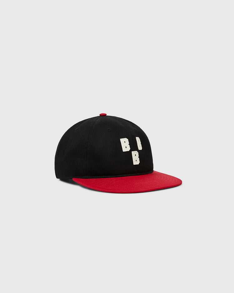 The Ebbets Field Birmingham Black Barons 1948 Cotton Twill Ballcap features a black crown, red brim, and white 