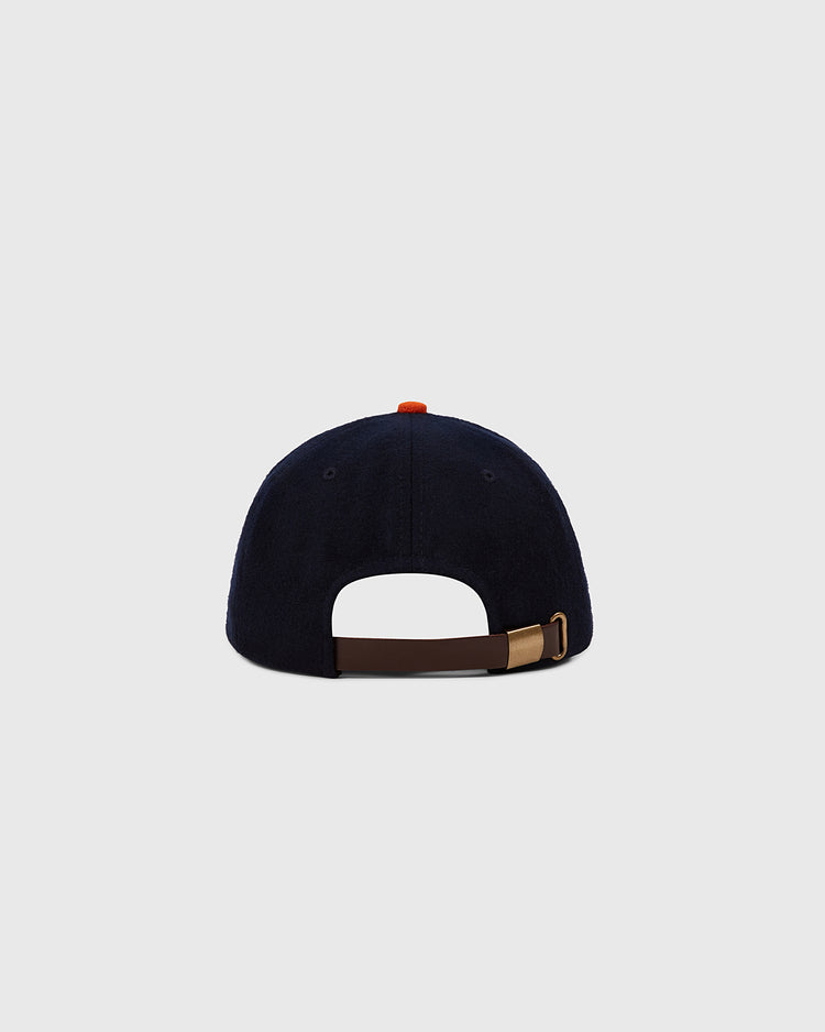 The Ebbets Field Hiroshima Carp 1958 Authentic Wool Ballcap is a black hat with a brown band, inspired by the original 1958 design.