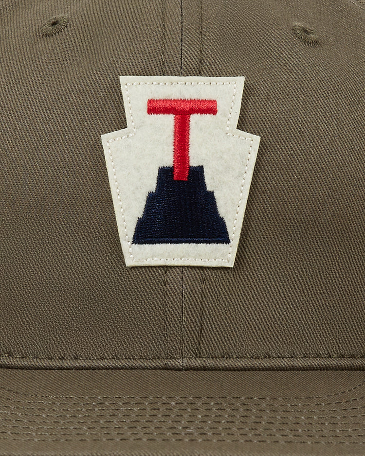 The Ebbets Field Tabasco Plataneros Cotton Twill Ballcap features a khaki design with a patch showing a red 