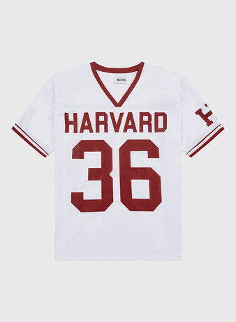 The Ebbets Field Harvard Vintage Mesh Football Jersey features white mesh with red trim, bold HARVARD and 36 in red on the front, a red H on the left sleeve, and classic football style. Made in the USA.