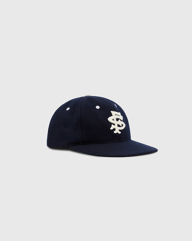 The EFF San Francisco Seals 1949 Authentic Wool Ballcap features a navy blue design with a white embroidered interlocking LS logo on the front, shown against a plain light gray background—classic Pacific Coast League style.