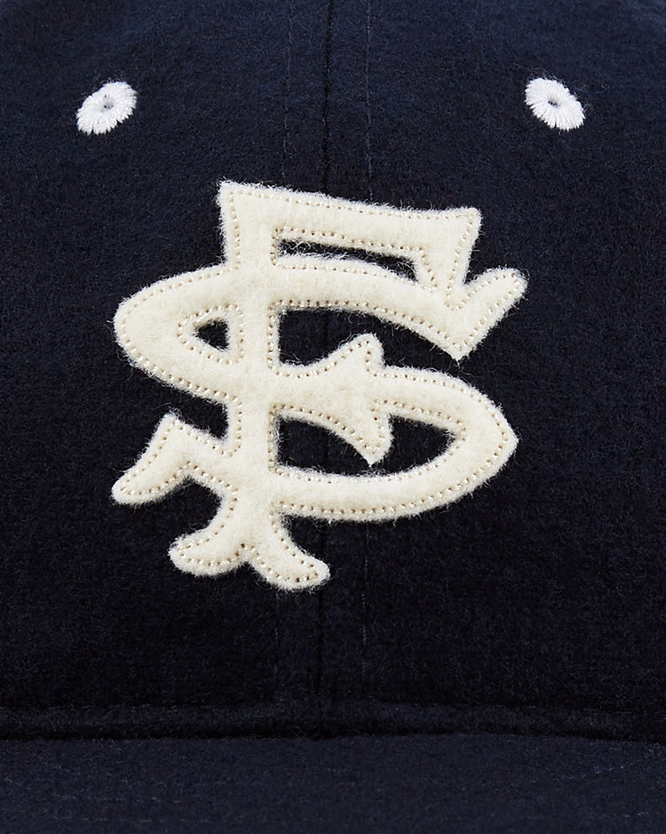 Close-up of an EFF San Francisco Seals 1949 Authentic Wool Ballcap, featuring a bold cream SF logo on the front—a classic design from the Pacific Coast League era.