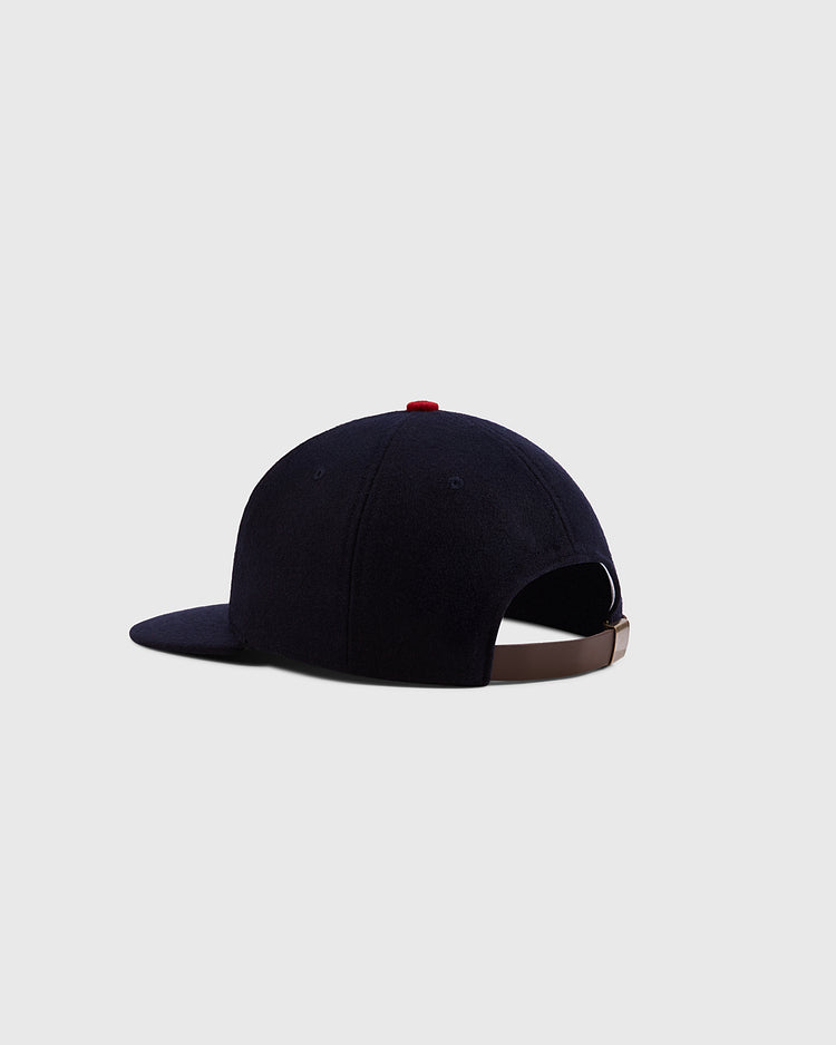 The Ebbets Field Mystery Caps of Mexico – Carta Blanca 1939 Authentic Wool Ballcap, shown from the back with a brown adjustable strap and red top button on a light gray background, is a must-have for Mexican baseball history fans.