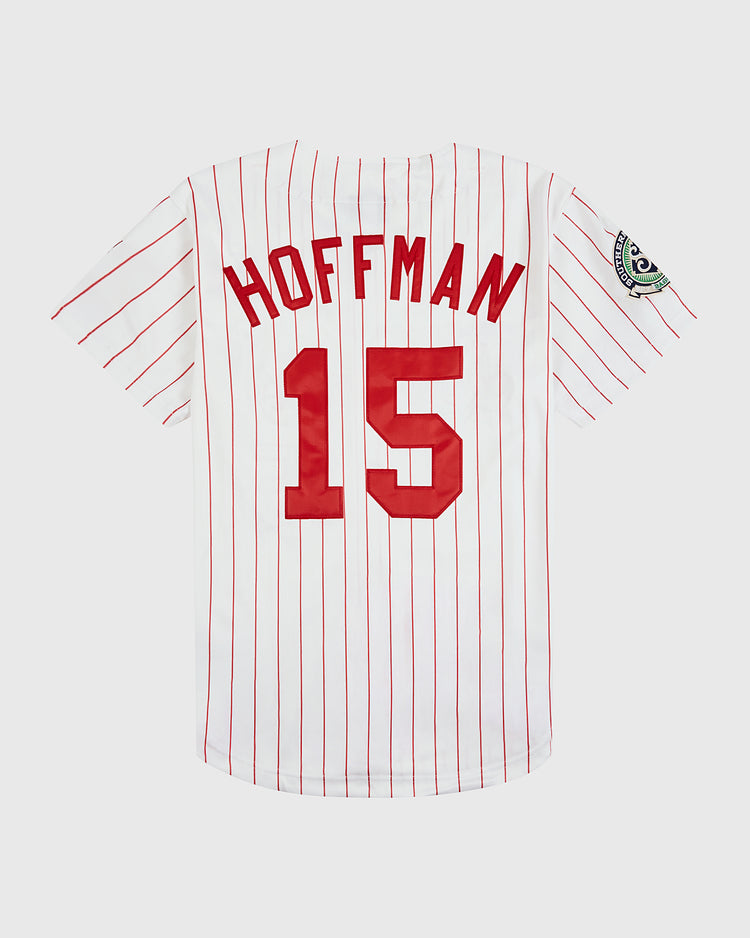 The EFF Trevor Hoffman Chattanooga Lookouts Button Up Jersey is a white jersey with red pinstripes, featuring HOFFMAN and number 15 in red on the back, plus a green and white patch on the left sleeve.