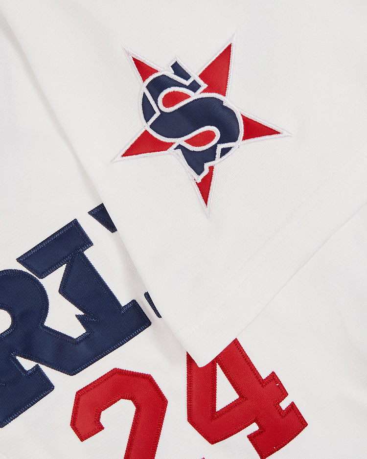 Close-up of the Ebbets Field Ken Griffey Jr Bernardino Spirit Button Up Jersey, showcasing white fabric with a red and blue star 