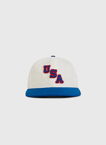 The Ebbets Field USA 1960 Wool Ballcap features a white crown, blue brim, and 