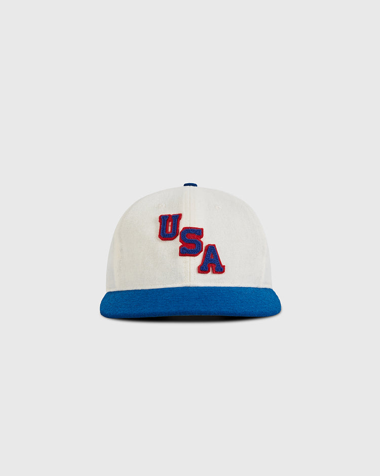 The Ebbets Field USA 1960 Wool Ballcap features a white crown, blue brim, and 