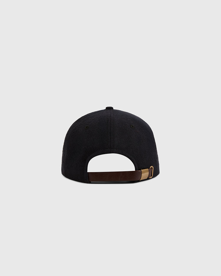 The Ebbets Field Pittsburgh Crawfords 1933 Authentic Wool Ballcap, inspired by classic Negro League styles, is shown from the back with a brown adjustable strap and brass buckle on a light gray background.