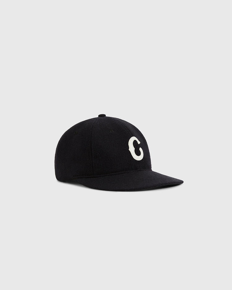 The Ebbets Field Pittsburgh Crawfords 1933 Authentic Wool Ballcap features black wool, a curved brim, and a large white “C” on the front, inspired by the iconic cap and shown on a light gray background.
