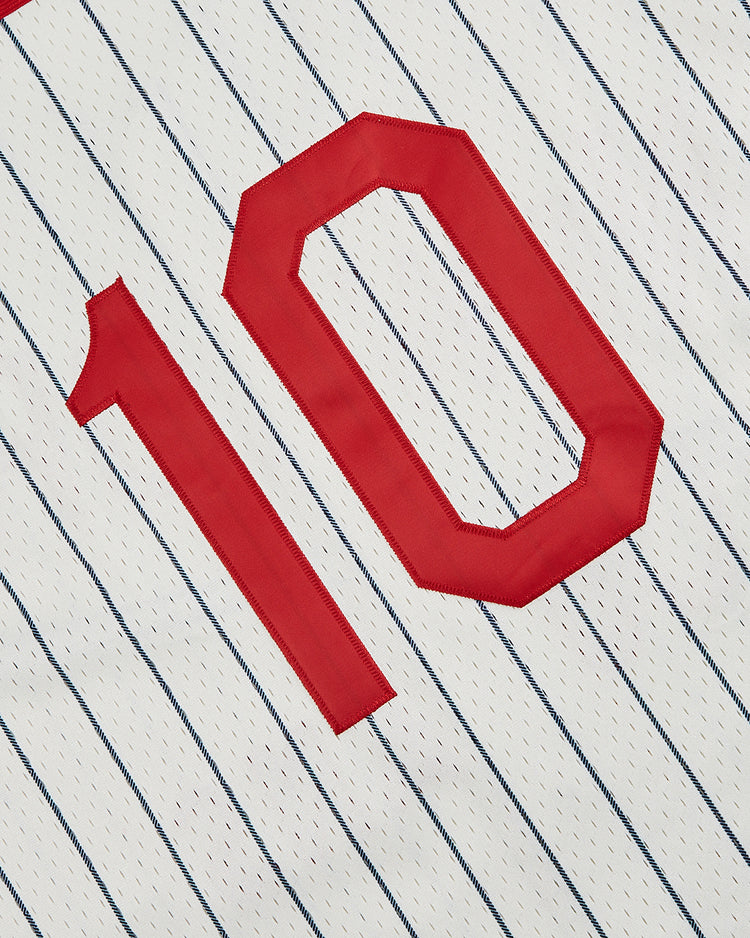 The Ebbets Field New York Cubans Mesh Baseball Jersey features thin blue pinstripes and a bold red number 10 on the front, inspired by the classic NY Cubans Negro League team style.