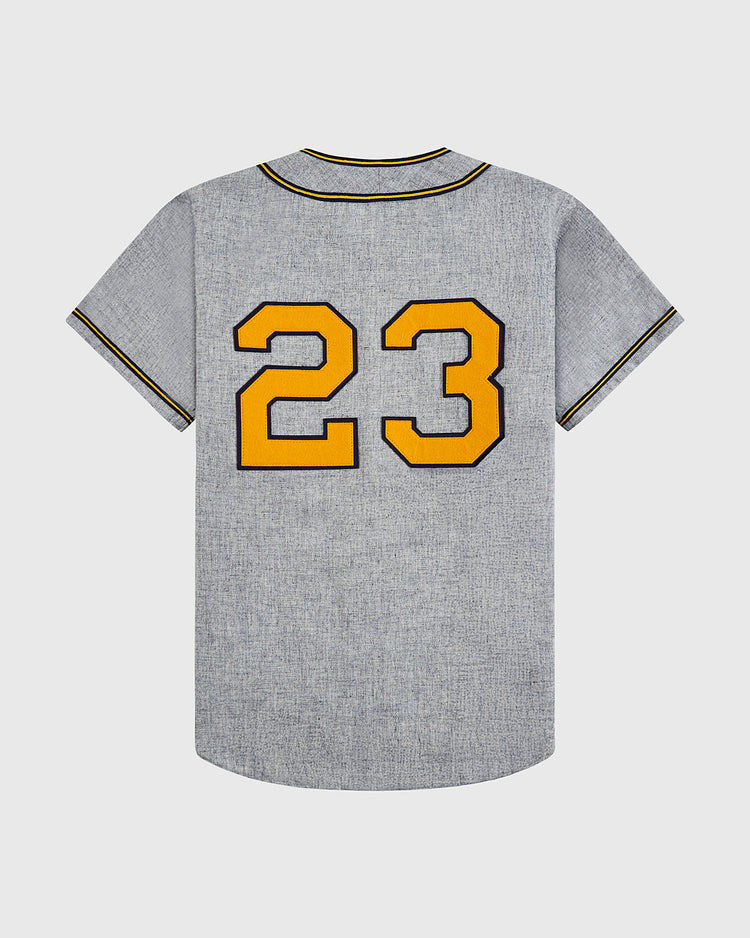 The EFF Kansas City Monarchs 1945 Authentic Wool Road Baseball Jersey is gray with black and yellow trim, short sleeves, and a large yellow and black number 23 on the back, displayed against a plain light background.