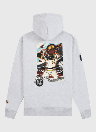 Celebrate Black History Month in style with the Karabo Poppy x Ebbets Field Roberto Clemente Heavyweight Cotton Pullover Hoodie, featuring a vibrant illustrated back graphic of Clemente by Ebbets Field.