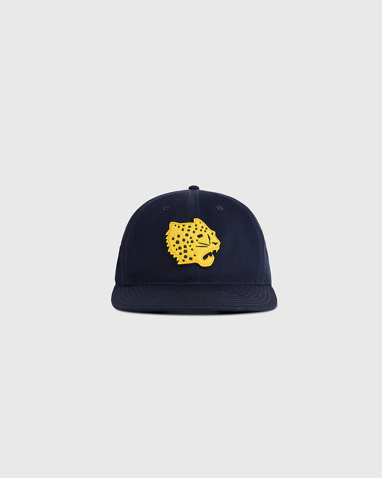 The Ebbets Field Santa Clara Leopardos 1925 Cotton Twill Ballcap features a navy blue design with a yellow cheetah head embroidered on the front, shown against a plain light gray background.