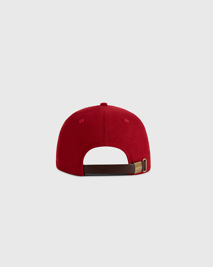 The Ebbets Field Mexico City Diablos Rojos 1957 Authentic Wool Ballcap is shown from the back in red, with a brown adjustable strap and metal buckle, set against a plain light gray background.
