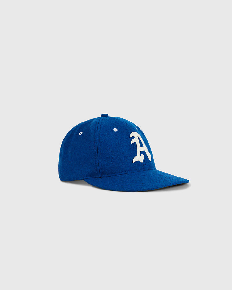 The Ebbets Field Almendares Alacranes 1947 Authentic Wool Ballcap features vintage blue wool, a curved brim, and a white embroidered 