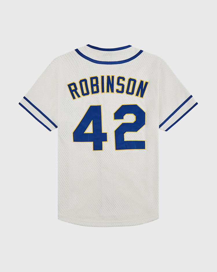 The Ebbets Field Jackie Robinson Comic Book Hero Mesh Baseball Jersey is white with blue and yellow trim, featuring ROBINSON and number 42 in blue with yellow outline on the back, honoring the barrier-breaking legend.