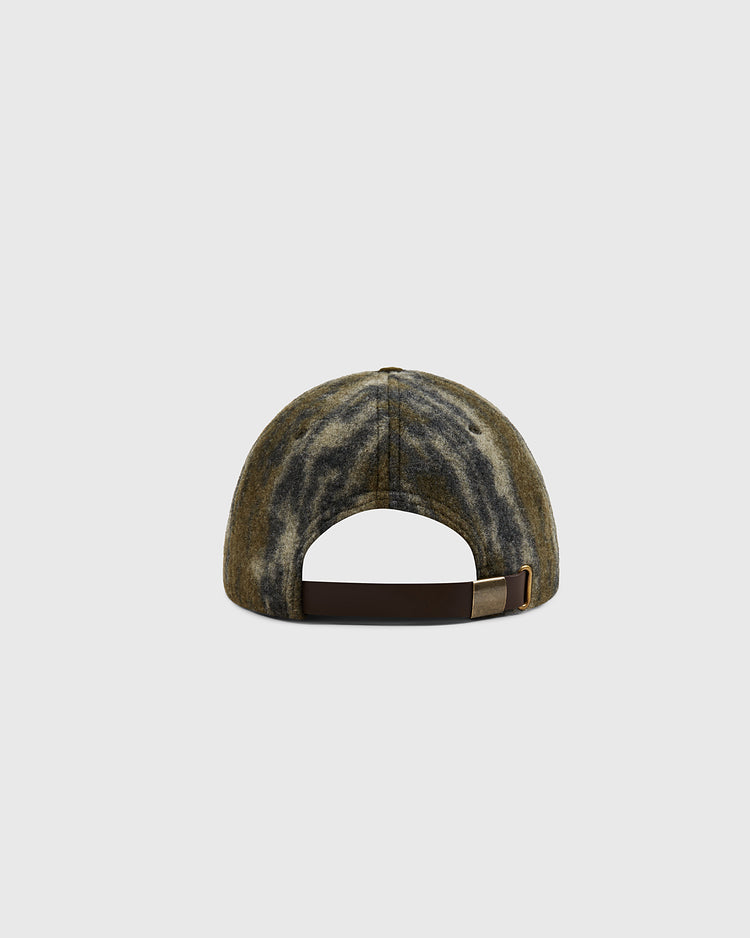 A back view of the Ebbets Field Mossy Oak x 1966 University of Notre Dame Ballcap in Bottomland camo, showcasing an adjustable brown strap and buckle, set against a plain light gray background.