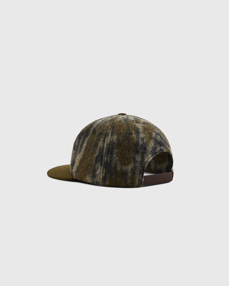 The Ebbets Field Mossy Oak x 1949 Los Angeles Angels (PCL) Ballcap features a Mossy Oak Bottomland camo design, a curved brim, and an adjustable back strap, shown from the side and back against a plain light gray background.