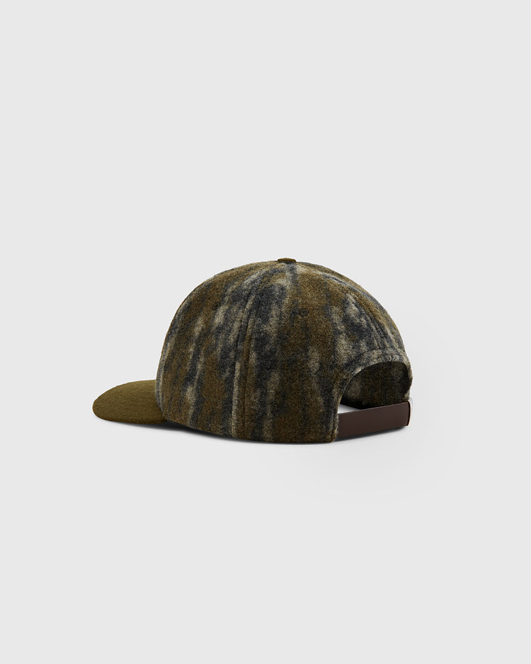 The Ebbets Field Mossy Oak x Ebbets Field Vintage Tree Logo Ballcap features a camo wool design in green, brown, and gray with an abstract Bottomland pattern, shown from the back and side with an adjustable strap.