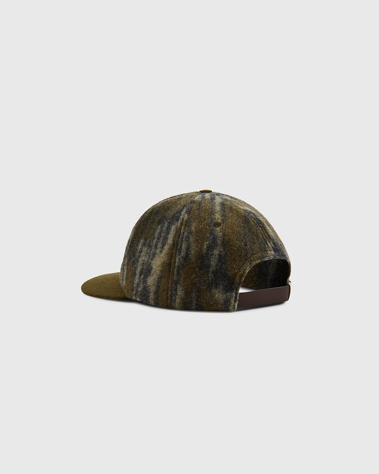 The Mossy Oak x Ebbets Field 1961 Kansas City Katz Ballcap by Ebbets Field is a wool baseball hat with a green and black tie-dye pattern, brown adjustable strap, and vintage style—displayed from the back on a light gray background.
