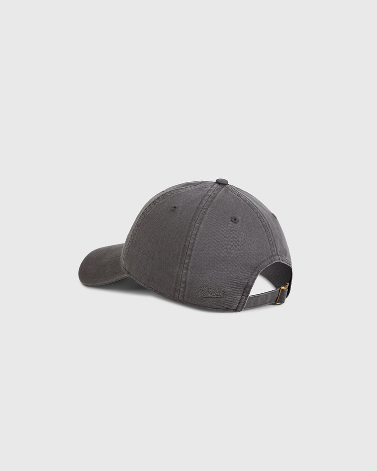 The Ebbets Field Fordham Bronx Roller Rink Washed Cotton Ballcap in dark gray is shown from the back, highlighting its adjustable strap with metal buckle and stitched panels against a plain light background.