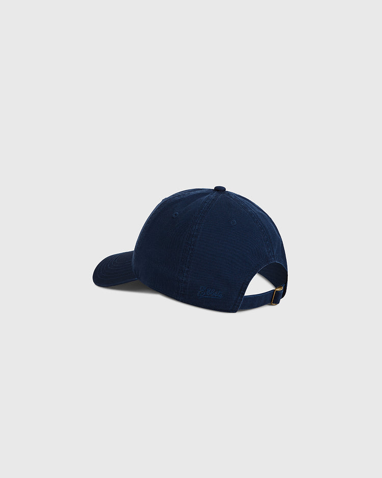 The Ebbets Field Chicago New Planet Roller Rink Washed Cotton Ballcap is shown from the back, displaying its curved brim and adjustable strap with metal buckle against a plain light gray background.