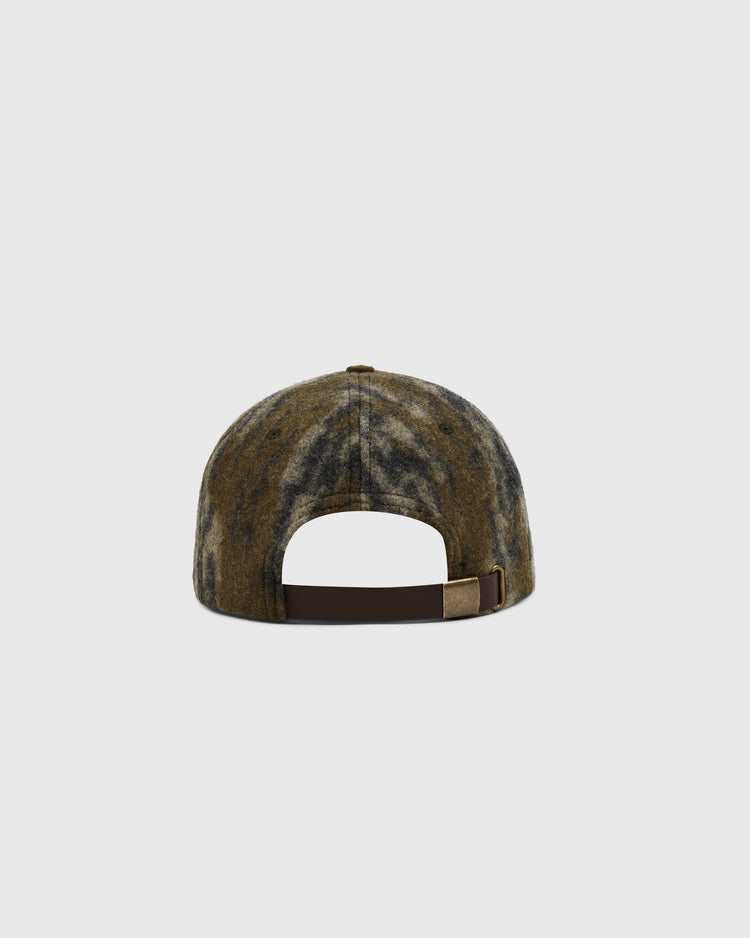 The Ebbets Field Mossy Oak x 1956 USA National Team Ballcap is shown from the back in Bottomland Camo, featuring a dark brown adjustable strap with metallic clasp against a plain white background.