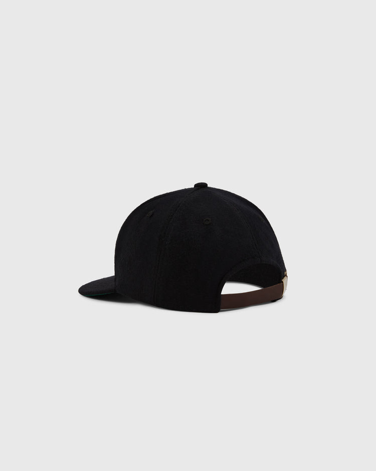The EFF Los Angeles (PCL) 1949 Authentic Wool Ballcap in black is shown from the back, highlighting its brown adjustable strap and metal clasp, against a plain light gray background.