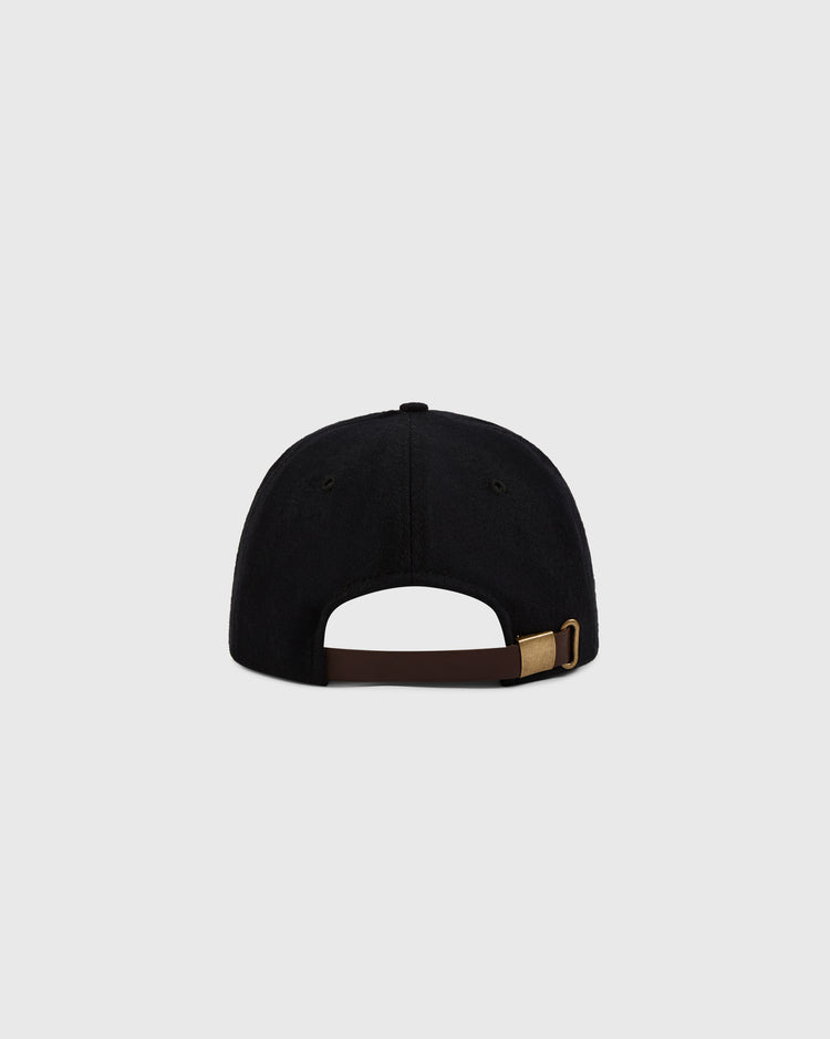 The EFF Los Angeles (PCL) 1949 Authentic Wool Ballcap in black is shown from the back, featuring a brown adjustable strap with a brass buckle against a plain light gray background.