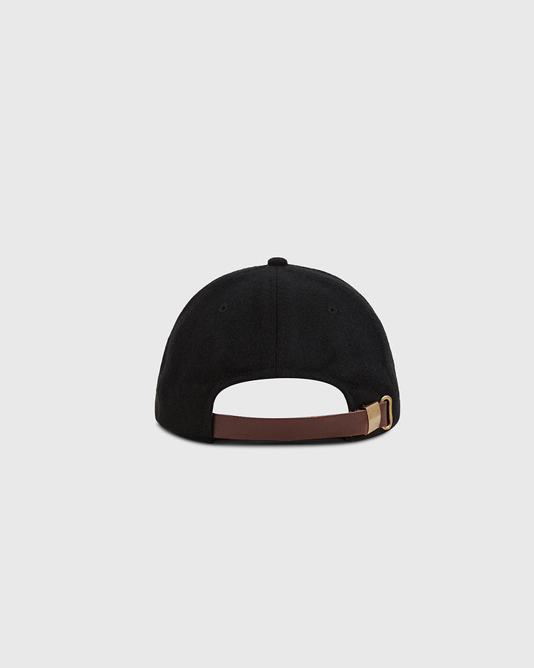 The Ebbets Field San Francisco City Series Wool Ballcap is shown from the back, featuring a brown adjustable strap with a gold buckle against a plain light gray background.