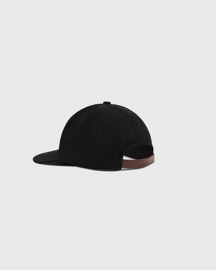 The Ebbets Field San Francisco City Series Wool Ballcap is shown from the back, displaying a brown adjustable strap with a plain light gray background.