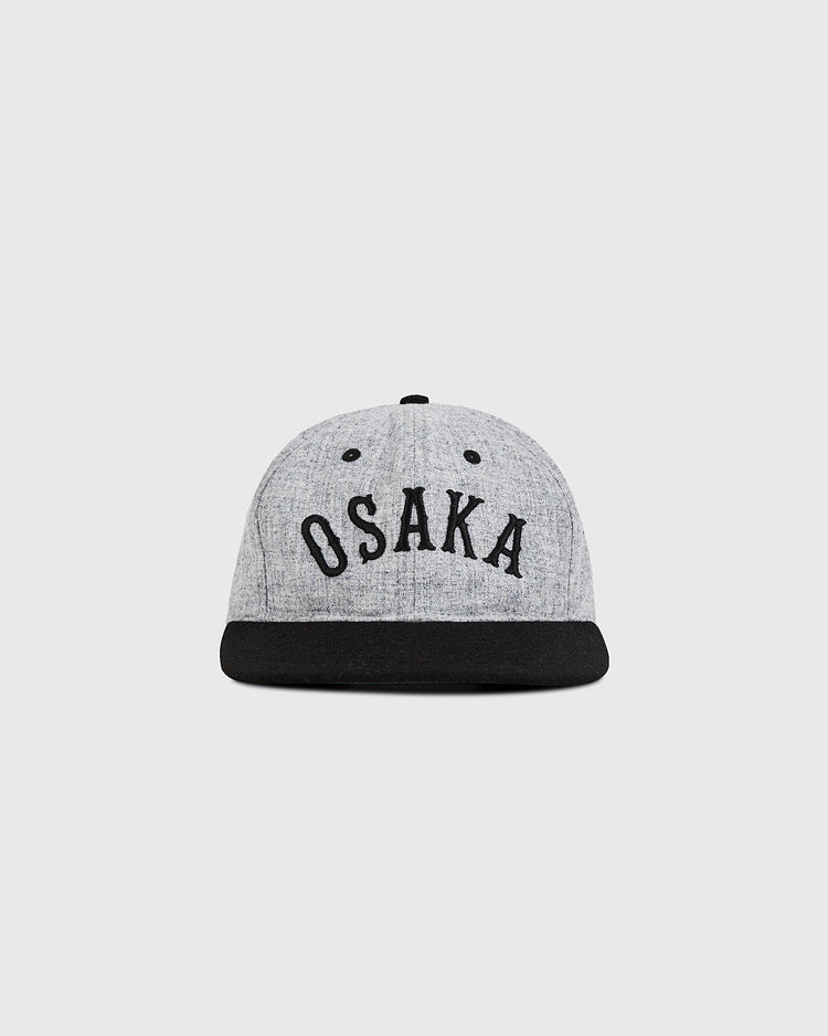 The Ebbets Field Osaka City Series Wool Ballcap features a grey crown, black brim, and bold black 