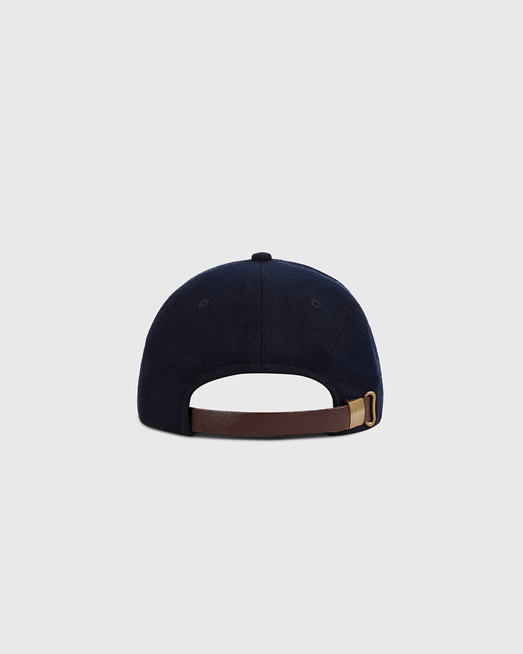 The Ebbets Field Santurce Cangrejeros Crab Wool Ballcap is shown from the back, displaying a brown adjustable strap with gold buckle. Inspired by Puerto Rican baseball, it rests on a plain light gray background.