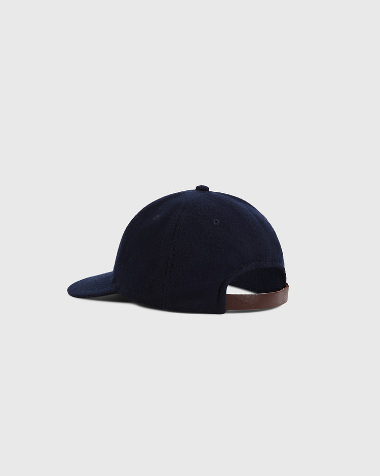 The Ebbets Field Santurce Cangrejeros Crab Wool Ballcap, in navy blue with a brown adjustable strap and curved bill, is shown from the back against a light gray background—a classic tribute to Puerto Rican baseball style.