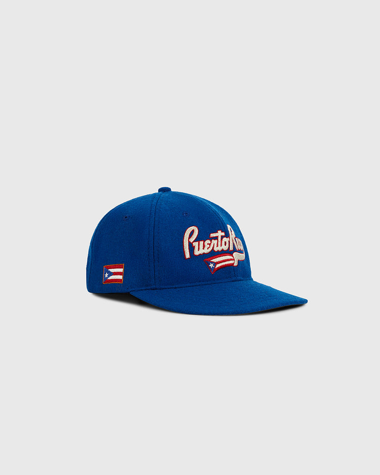 The Ebbets Field Puerto Rico 1972 National Team Wool Ballcap is a blue cap with 