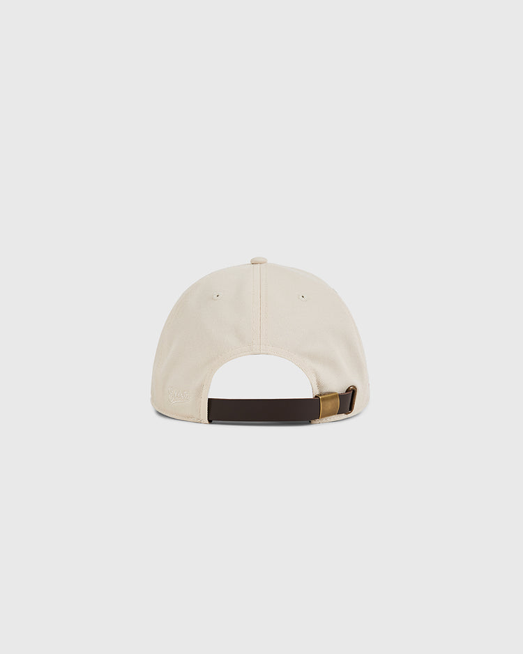The Puerto Rico 1972 National Team Cotton Twill Ballcap by Ebbets Field is shown from the back, highlighting its brown adjustable strap with a metal buckle. The beige hat is set against a plain white background.