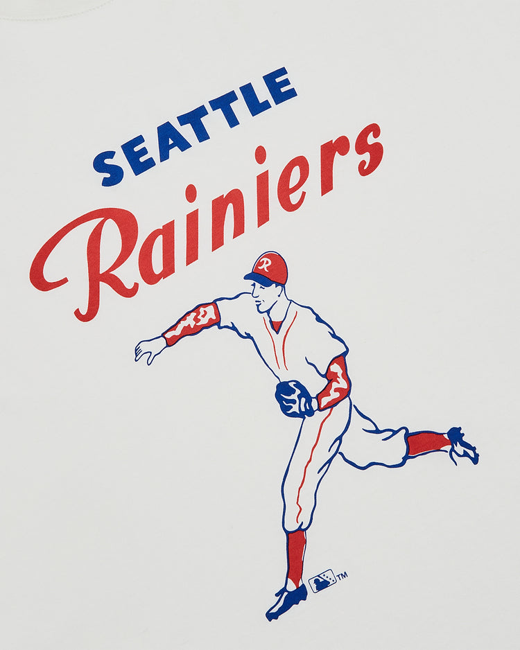 The Ebbets Field Seattle Rainiers Short Sleeve Graphic Tee features a vintage-style graphic of a pitcher, with 